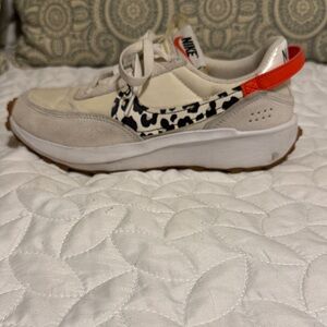 Nike Cream and Orange Leopard Sneakers